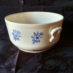Old salad bowl in blue and white earthenware, cache pot, soup tureen