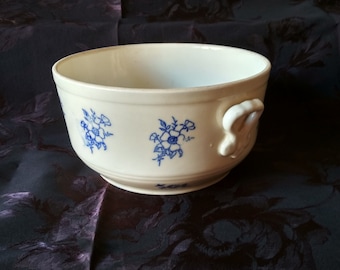 Old salad bowl in blue and white earthenware, cache pot, soup tureen