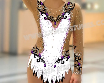 May include: A white leotard with black and purple accents. The leotard has a long sleeve design and is covered in rhinestones. The leotard is designed for gymnastics.