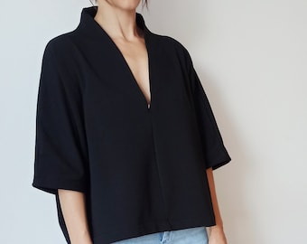 Top minimalista con cuello en V, suéter de punto extragrande para mujer, top de manga 3/4