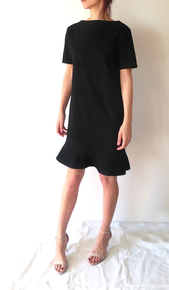 Minimalist Black Jersey Dress: Flounced Tunic, Elegant Casual Minimalist Black Jersey Dress: Flounced Tunic, Elegant Casual