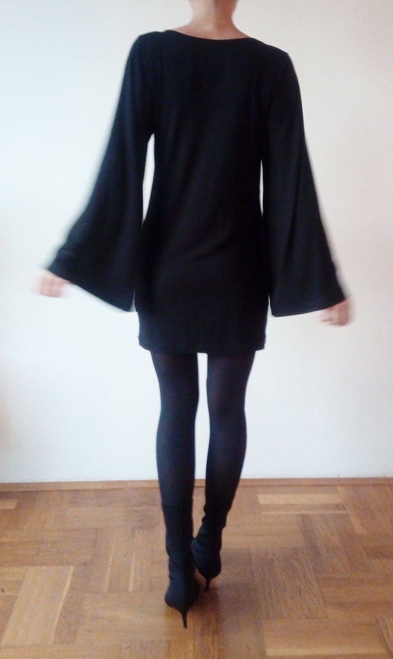 black dress with wide sleeves
