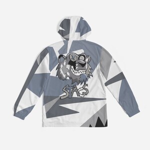 May include: A white, gray, and blue hooded jacket with a cartoon animal graphic and the word "STAGS" on the back.
