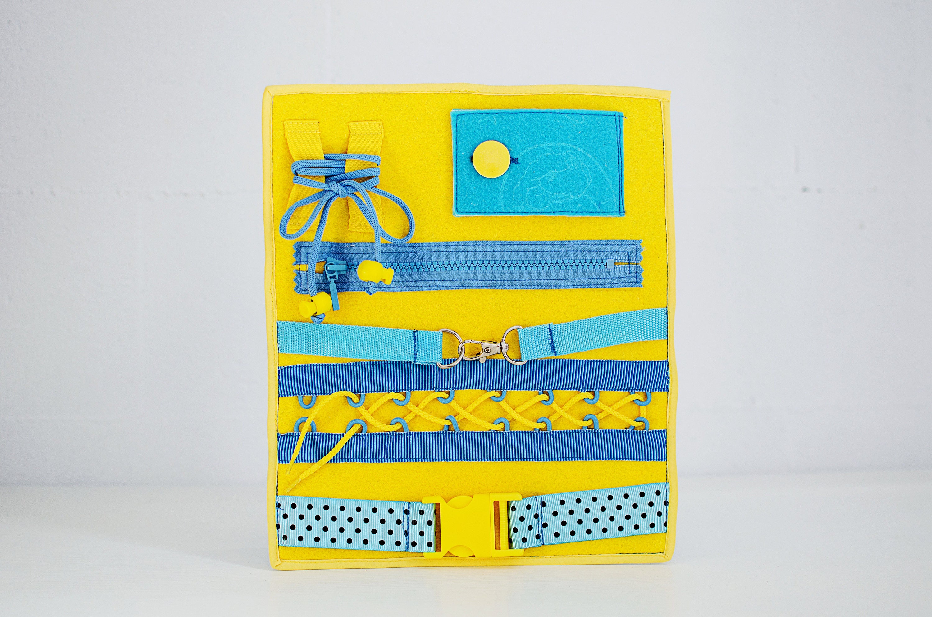 buckle toy busy board