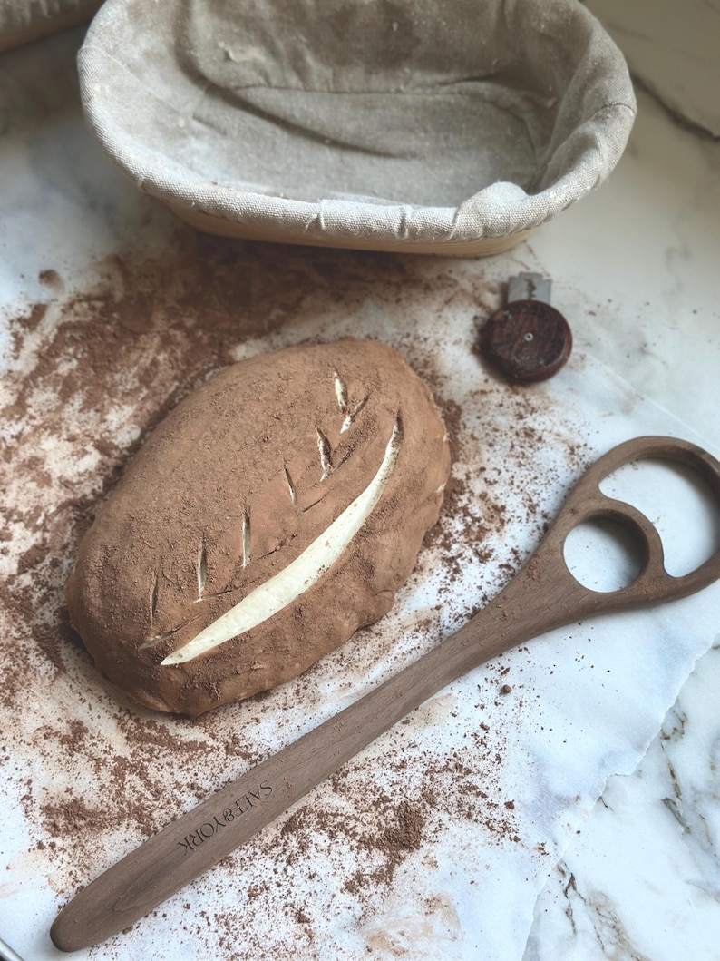 Elevate your baking experience with our beautifully fully handcrafted wooden dough hook, made from premium walnut wood. Measuring 13 inches in length, this essential kitchen tool is perfect for kneading sourdough, pizza dough, and more