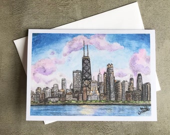 May include: A watercolor painting of the Chicago skyline with pink clouds in the sky. The tallest building in the center is the Willis Tower, formerly known as the Sears Tower.