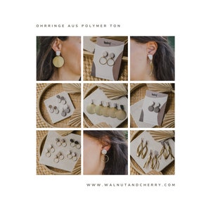 May include: A collection of gold and white polymer clay earrings. The earrings are displayed on a wooden surface and on models' ears. The earrings feature various shapes, including circles, shells, and abstract designs. The text "OHRRINGE AUS POLYMER TON" and "WWW.WALNUTANDCHERRY.COM" are visible in the image.