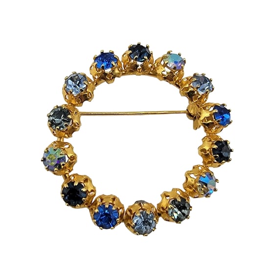 Austria Gold Tone Blue Rhinestone Open Round Filigree Brooch Pin