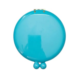 May include: A round, blue compact mirror with a gold clasp and two small, round knobs on the bottom.