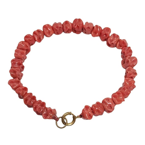 Chunky Coral-Colored Molded Glass Knotted Bead Thumb Clasp Bracelet. 8.5"