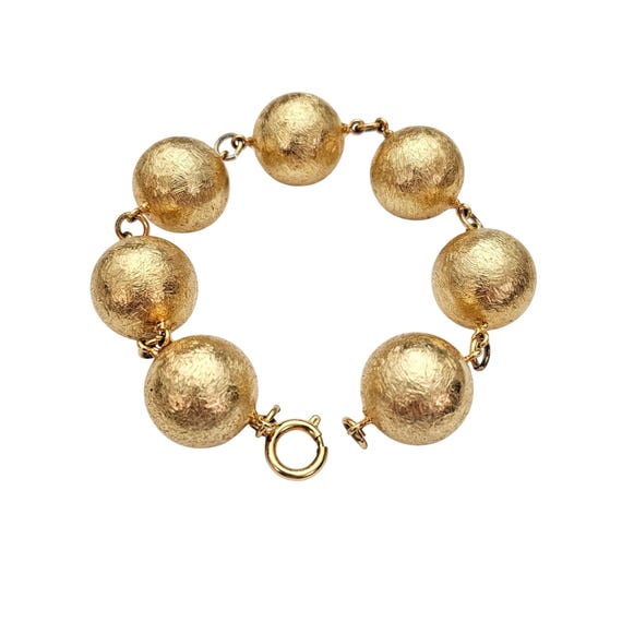 Gold Tone, Plated 10 mm Textured Metal Ball Bracelet J585