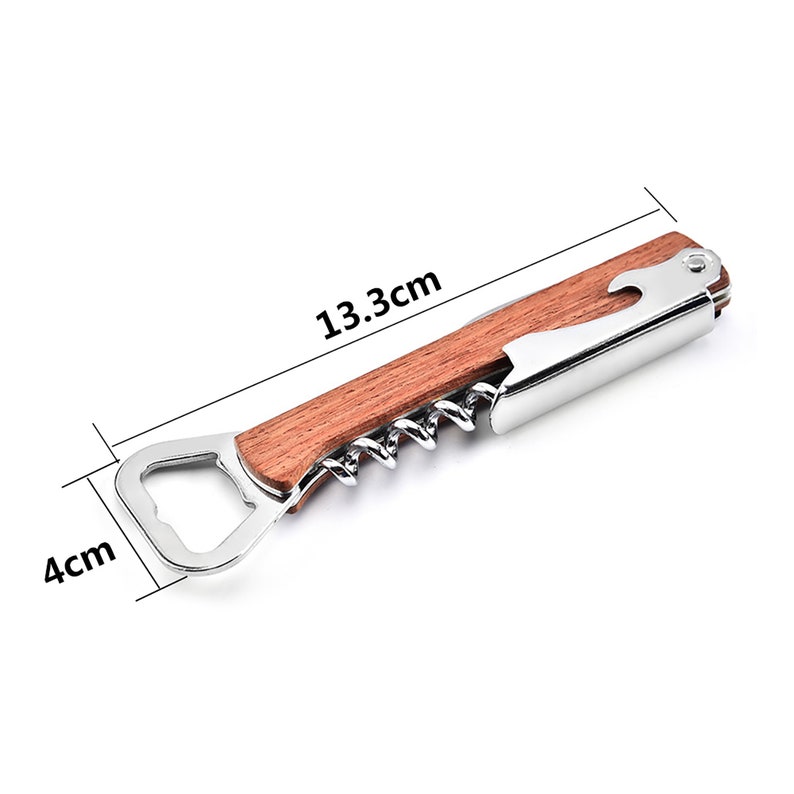 May include: A silver and wooden bottle opener with a corkscrew and a bottle cap opener. The opener is 13.3 inches long and 4 inches wide.