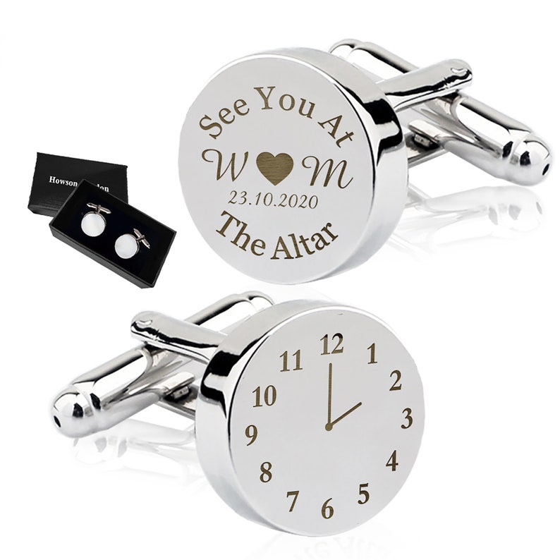 May include: Silver cufflinks with a circular design. One cufflink has the text "See You At The Altar" with the date "23.10.2020" and the initials "W&hearts;M". The other cufflink has a clock face with the hour hand pointing to 12.