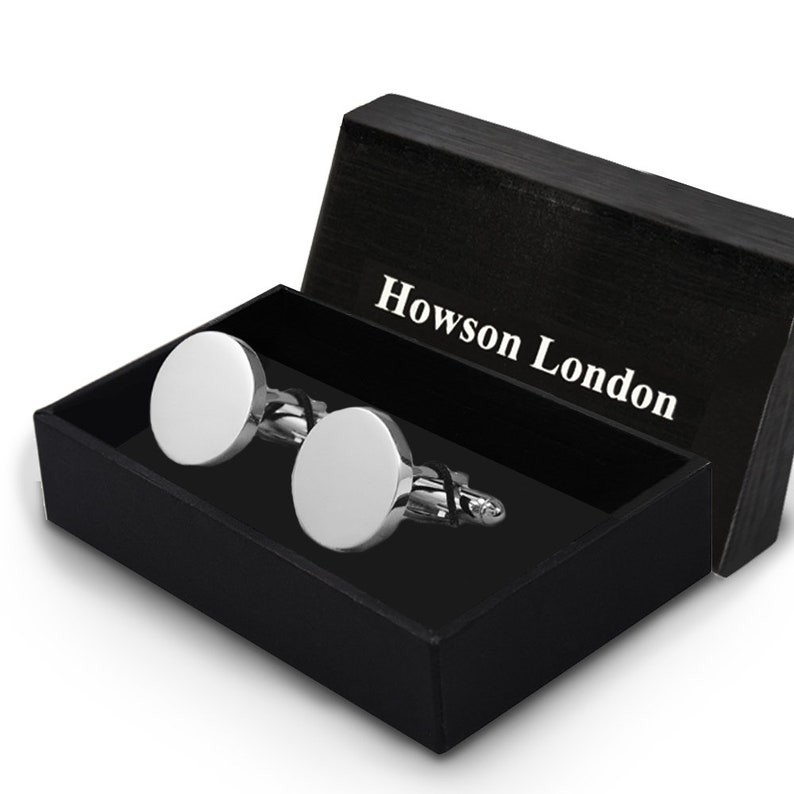 May include: A pair of silver cufflinks in a black box with the text "Howson London" on the lid.