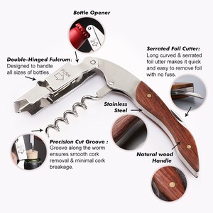 May include: A stainless steel bottle opener with a wooden handle. The opener has a serrated foil cutter, a double-hinged fulcrum, and a precision cut groove for smooth cork removal. The text "Push" is visible on the opener.