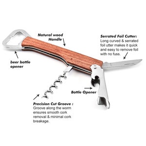 May include: A multi-tool bottle opener with a wooden handle. It features a bottle opener, a corkscrew, and a serrated foil cutter. The tool is labeled "Natural wood Handle", "Serrated Foil Cutter", "Precision Cut Groove", and "Bottle Opener".