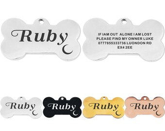 May include: A silver, black, gold, and rose gold bone-shaped dog tag with the name "Ruby" engraved on it. The silver tag also includes the text "IF IAM OUT ALONE IAM LOST PLEASE FIND MY OWNER LUKE 0777855333736 LUONDON RD EX4 2EE".