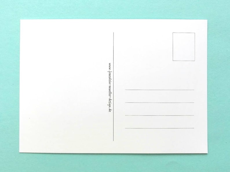 May include: A blank white postcard with a rectangular stamp box and horizontal lines for writing. The text "www.fraulein-mueller-design.de" is printed vertically along the left side. The postcard is on a light teal background.