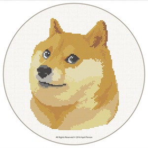 May include: A cross-stitch pattern of a Shiba Inu dog with a surprised expression. The dog is brown and white with a black nose and black eyes. The background is white.