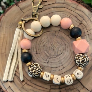 Llavero con cuentas para mamá, ideal como regalo de cumpleaños para mamá, llavero con diseño de leopardo, pulsera de cuentas de silicona, llavero personalizado con manos libres.
