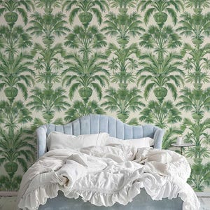 Green tropical wall mural with exotic palm leaves