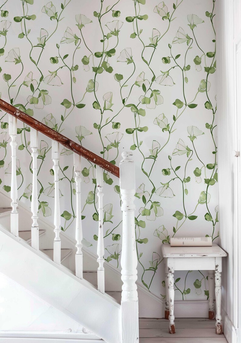 Green leaf and white sweet pea bloom wallpaper for a serene home decor.