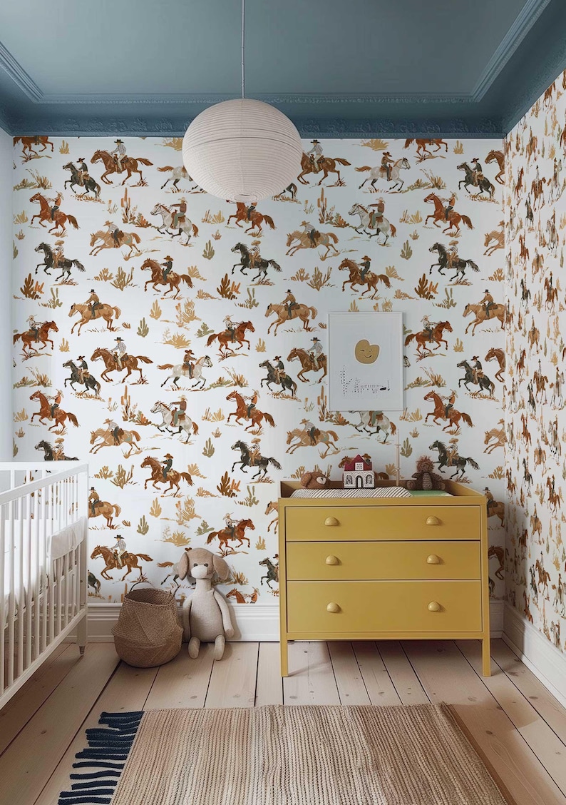 Western wallpaper with cowboys riding horses