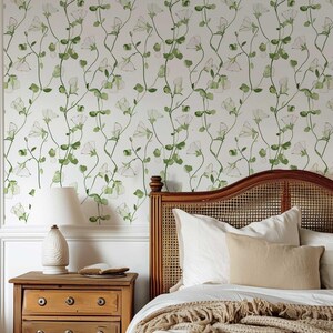 Traditional wallpaper showcasing an intricate design of sweet pea flowers and leaf vines.