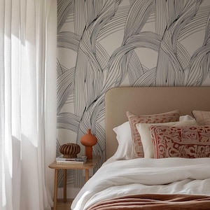 Removable black and white peel and stick wallpaper.