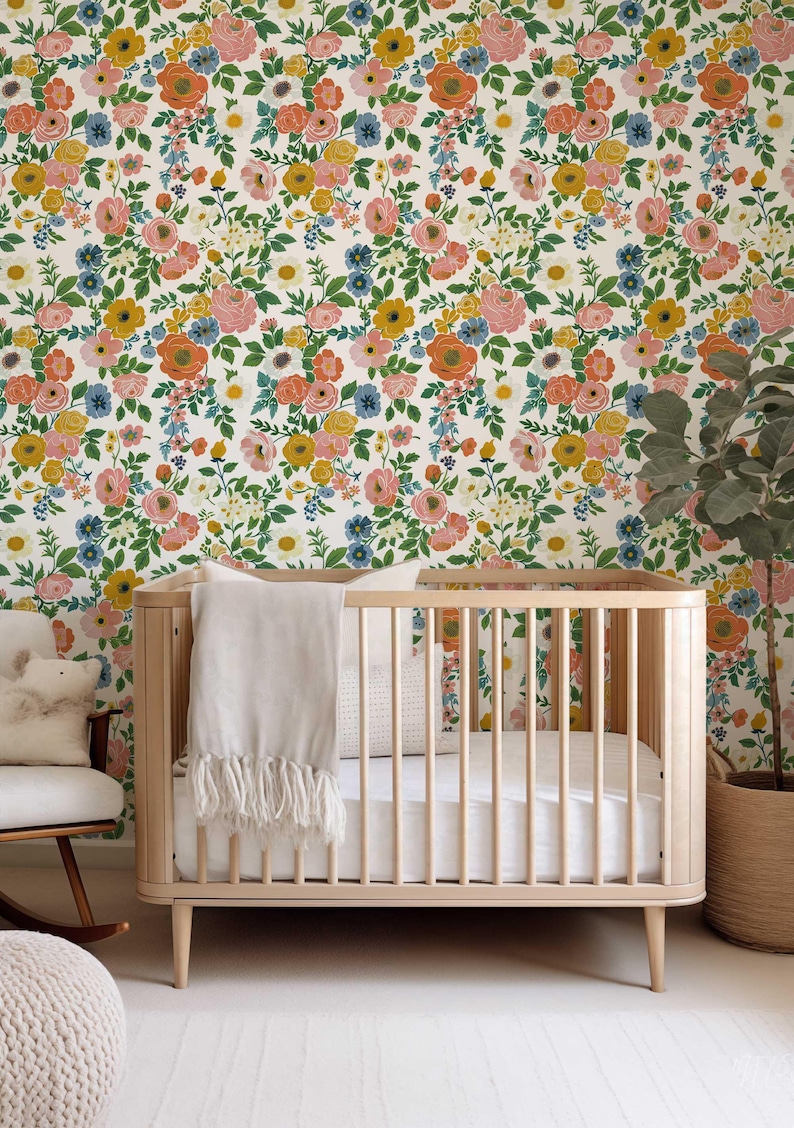 Cheerful summer wallpaper with a vivid rose garden design, available in easy-to-apply peel and stick or classic traditional materials.