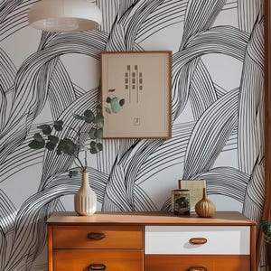 Black and white wallpaper for contemporary rooms.
Renters-friendly geometric line wall covering.