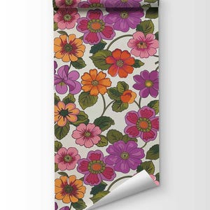 Energize your space with colorful 70s flower pattern wallpaper available in peel and stick and traditional options.
