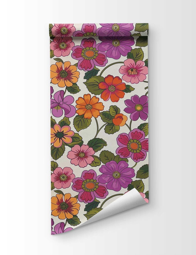 Energize your space with colorful 70s flower pattern wallpaper available in peel and stick and traditional options.