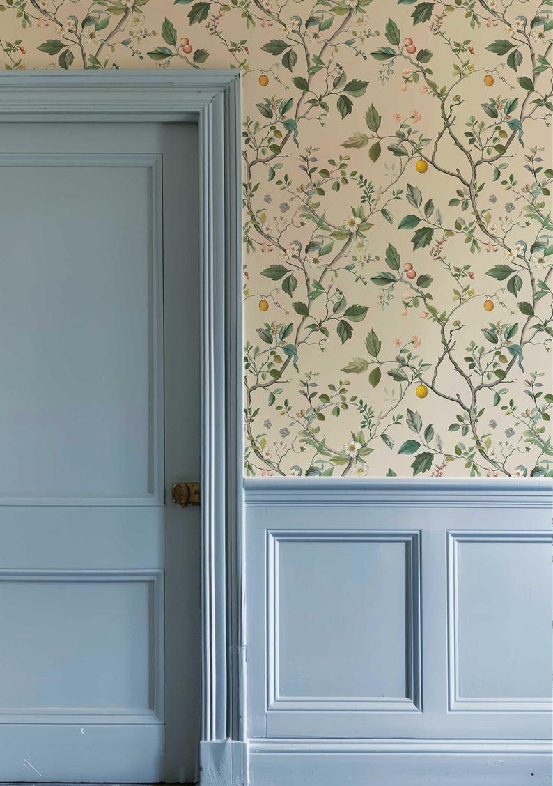 Our Chinoiserie Peel and Stick Wall Mural brings a soft, floral touch to your space. Featuring branches, leaves, and small fruits in light pastel colors, this removable wallpaper is perfect for boho nursery accent wall decor