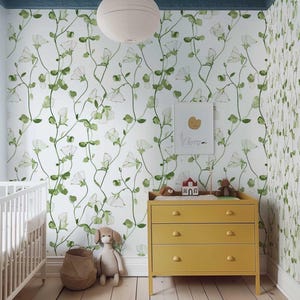 Elegant floral wallpaper featuring sweet pea flowers and green vines.