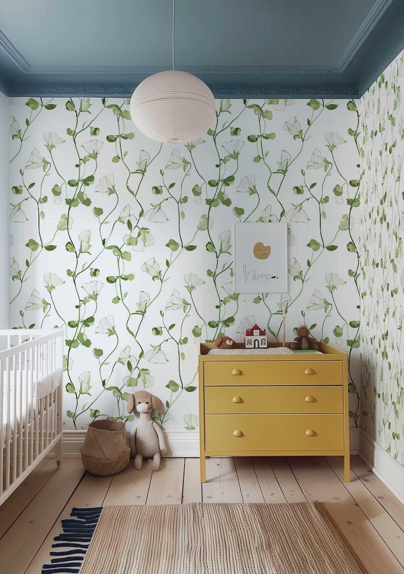 Elegant floral wallpaper featuring sweet pea flowers and green vines.