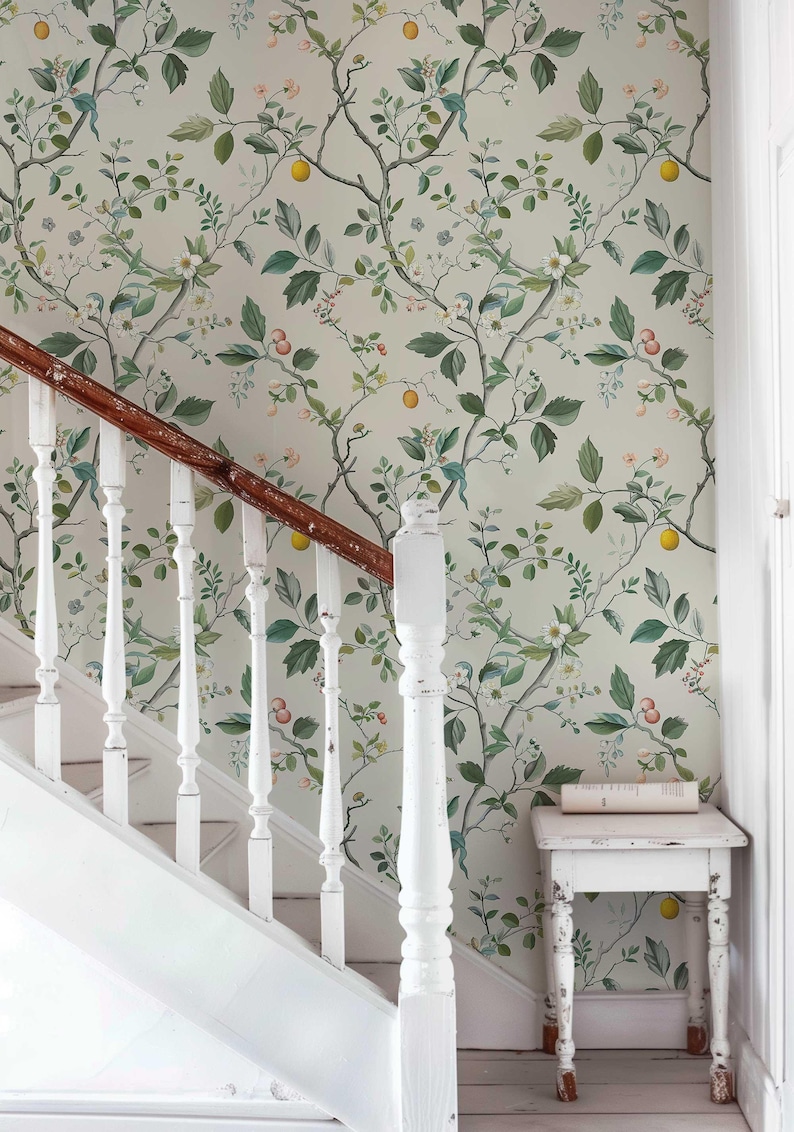 Create a serene and stylish accent wall with our Chinoiserie Peel and Stick Wall Mural. Featuring floral and fruit designs in light pastel colors, this removable wallpaper is perfect for boho nursery decor