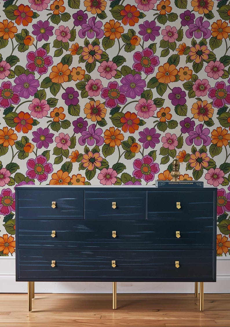 Peel and stick wallpaper showcasing a colorful and funky 70s-style flower design.