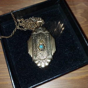 Vintage Etruscan style gold plated locket with turquoise stone on long gold tone chain Adrien Mann London gift boxed ships worldwide