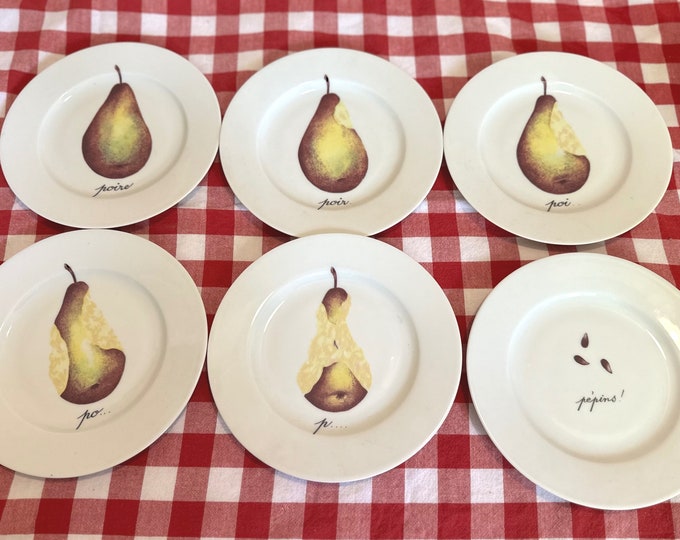 Limoges Dessert Plates, Email de Limoges, Porcelaine de Solange, Set of Six Pear Plates Showing Whimsical Images of a Pear Being Eaten