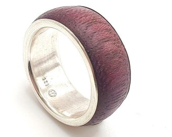 Wooden rings combined with silver can be personalised