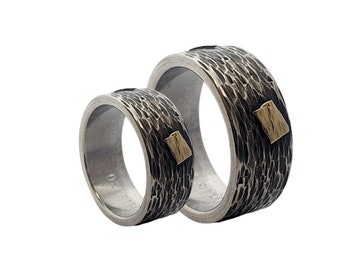 Unique partner rings made of 925 silver with 585 gold leaves
