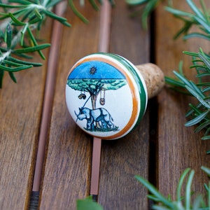 Ram District. Italian Ceramic Stopper for bottle of wine or liquor with the typical decoration of the Contrade of Palio of Siena Ram District. Italian Ceramic Stopper for bottle of wine or liquor with the typical decoration of the Contrade of Palio of Siena