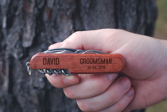 396 hearts don't lie — this custom-engraved wooden multitool pocket knife is the groomsmen gift that actually gets kept instead of tossed in a drawer.