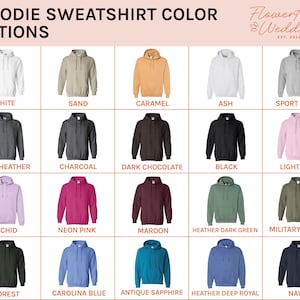 May include: A color chart of hoodie sweatshirt options. The image displays 20 different hoodie colors, including white, sand, caramel, ash, sport grey, dark heather, charcoal, dark chocolate, black, light pink, orchid, neon pink, maroon, heather dark green, military green, forest, carolina blue, antique sapphire, heather deep royal, and navy.