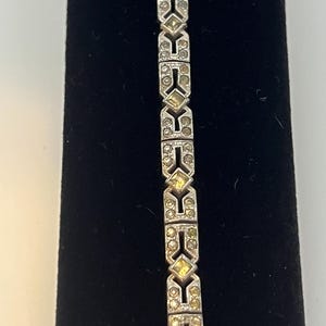 Art Deco sterling silver geometric link bracelet with paste stones.