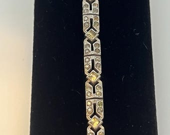 Art Deco sterling silver geometric link bracelet with paste stones.