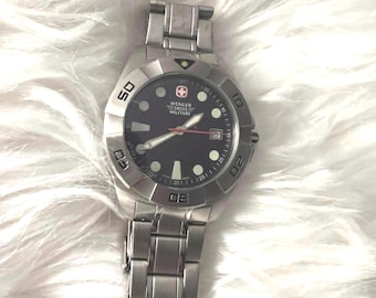 A Wenger Swiss Military stainless steel quartz dive watch.
