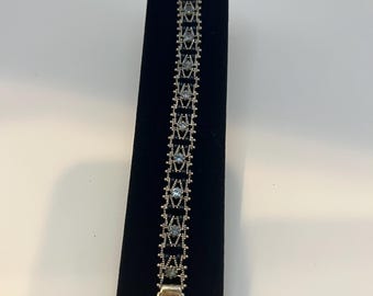 Vintage Art Deco style costume bracelet with faux stones.