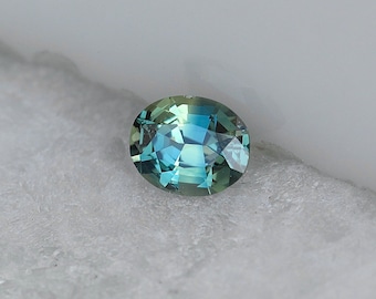 0.43 ct noheat parti sapphire madagascar| oval cut sapphire| bicolor sapphire|bicolor gemstone| top notch cut sapphire| beautiful sapphire.